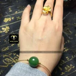 Lắc tay trái châu ngọc bích Canada, vàng 18k