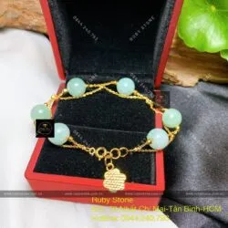 Lắc tay trái châu ngọc Cẩm thạch xanh lý, vàng 18k